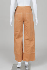 Load image into Gallery viewer, Oh7Days apricot wide leg pants with zipper front and white stitch detailing (S)
