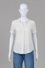 Load image into Gallery viewer, Theory crème short sleeve cuffed covered button blouse (S)
