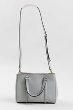Load image into Gallery viewer, Kate Spade light grey structured bag with handles and crossbody strap and zippered side pockets
