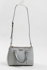 Load image into Gallery viewer, Kate Spade light grey structured bag with handles and crossbody strap and zippered side pockets
