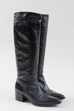 Load image into Gallery viewer, Miu Miu black leather knee high heeled boots with side silver zipper (7.5)
