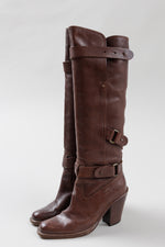 Load image into Gallery viewer, Barbara Bui brown knee high heeled slip on boots with adjustable straps (37)
