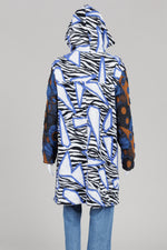 Load image into Gallery viewer, Kozan black&amp;white zebra pattern layered coat with blue geometric graphics (S) *New with tags $280
