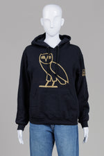 Load image into Gallery viewer, OVO (October's Very Own) OG owl black hoodie with gold metallic owl logo (S)
