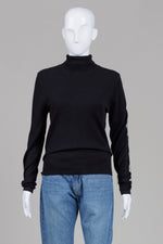Load image into Gallery viewer, Frank Lyman black long sleeve turtleneck sweater with open back and fringe (M)
