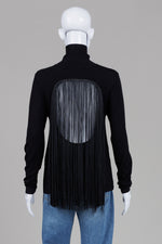 Load image into Gallery viewer, Frank Lyman black long sleeve turtleneck sweater with open back and fringe (M)
