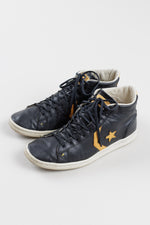 Load image into Gallery viewer, Converse Men’s black high top sneakers with yellow detailing (9.5)

