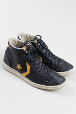 Load image into Gallery viewer, Converse Men’s black high top sneakers with yellow detailing (9.5)

