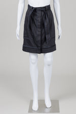 Load image into Gallery viewer, Elie Tahari black button up front skirt with self belt
