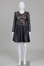 Load image into Gallery viewer, Moma black long sleeve dress with croche lace bodice over nude toned lining and flared pleated skirt (40)
