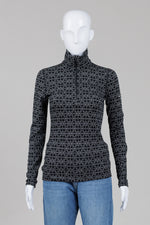 Load image into Gallery viewer, Icebreaker black and white geometric print long sleeve shirt with zippered collar (XS)
