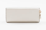 Load image into Gallery viewer, Coach white folio wallet with gold hardware
