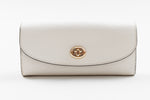 Load image into Gallery viewer, Coach white folio wallet with gold hardware
