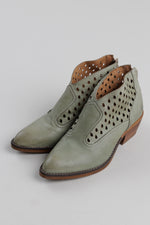 Load image into Gallery viewer, Casta light olive perforated leather ankle books with a stacked 2” heel (37).
