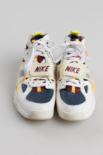 Load image into Gallery viewer, Nike Air Trainer Huarache ‘City Pride Houston’ sneakers with cream and navy colorway  and orange and yellow accents (6.5)
