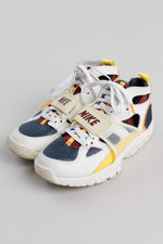 Load image into Gallery viewer, Nike Air Trainer Huarache ‘City Pride Houston’ sneakers with cream and navy colorway  and orange and yellow accents (6.5)
