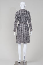 Load image into Gallery viewer, Diane Von Furstenberg black and white printed long sleeve wrap dress (S)
