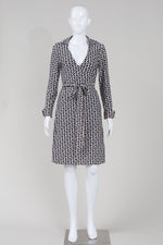 Load image into Gallery viewer, Diane Von Furstenberg black and white printed long sleeve wrap dress (S)
