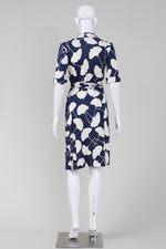 Load image into Gallery viewer, Diane Von Furstenberg navy with overall cream leaf print, short sleeved wrap dress (2)
