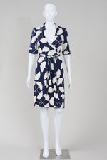 Load image into Gallery viewer, Diane Von Furstenberg navy with overall cream leaf print, short sleeved wrap dress (2)

