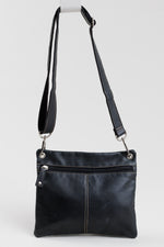 Load image into Gallery viewer, Fossil black leather cross body bag with silver hardware
