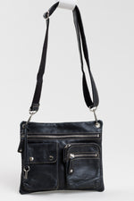 Load image into Gallery viewer, Fossil black leather cross body bag with silver hardware
