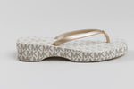 Load image into Gallery viewer, Michael Kors Lilo platform flip-flops in vanilla and pale gold (7)
