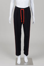 Load image into Gallery viewer, Essentiel Antwerp Black Stretch Jogger Pant with Red &amp; White stripe on side and red drawstring (36)
