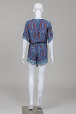 Load image into Gallery viewer, BCBCMaxAzria Women's Melodi Romper with blue depths combo print w/ matching tie (XS)
