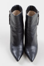 Load image into Gallery viewer, Michael Kors black stiletto pointed toe ankle books with silver zipper (7)
