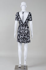 Load image into Gallery viewer, Sandro Black and White floral print short sleeve dress with deep V back
