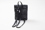 Load image into Gallery viewer, Derek Alexander black leather convertible backpack with burgandy trim and magnetic closure
