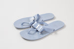 Load image into Gallery viewer, Michael Kors dusky blue jelly thong sandal with bow and silver metal accents (7)
