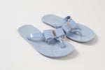 Load image into Gallery viewer, Michael Kors dusky blue jelly thong sandal with bow and silver metal accents (7)
