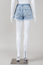 Load image into Gallery viewer, Agolde faded blue denim button front cut-off shorts
