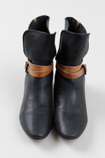 Load image into Gallery viewer, BCBG Max Azria black pebble leather booties with tan strap detail (37)
