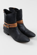 Load image into Gallery viewer, BCBG Max Azria black pebble leather booties with tan strap detail (37)
