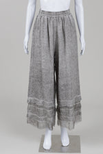 Load image into Gallery viewer, Sanctamuerte shadow grey linen wide legged pants with bottom ruffle detail (M) *new with tags $338
