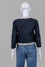 Load image into Gallery viewer, Elie Tahari blue woven denim-like blazer with white fringe trim, collarless neckline, open front (XS)
