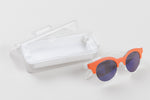 Load image into Gallery viewer, Swatch orange and white frosted sunglasses with round, blue toned reflective lenses.
