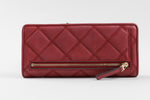 Load image into Gallery viewer, Tory Burch red leather wallet with gold zipper on back. Snap closure.
