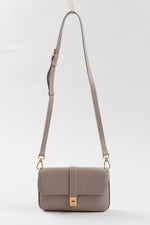 Load image into Gallery viewer, Leo et Violette taupe leather shoulder bag with gold hardware with optional short strap.
