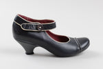 Load image into Gallery viewer, Fly London black leather with cream Mary Janes with velcro closure ankle strap and button detail (38)
