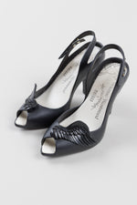 Load image into Gallery viewer, Vivienne Westwood rubber heels with adjustable ankle strap and angel wing detail on toe (6)
