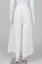 Load image into Gallery viewer, Noen off-white super wide leg pants with back elasticed waist and zipper front with pleating detail and front pockets(8) *new with tags $213
