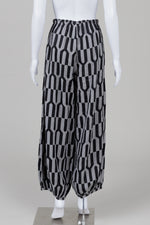 Load image into Gallery viewer, Bryn Walker black and grey geometric print palazzo pants with cinched ankle (S) *new with tags $229

