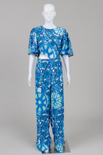 Load image into Gallery viewer, Rhode royal blue floral jumpsuit with cutout detail (L)
