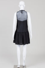 Load image into Gallery viewer, Rachel Zoe black sleeveless silk lined dress with sheer yolk and tiered bottom (4)
