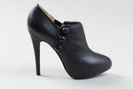 Load image into Gallery viewer, Christian Louboutin Black leather stiletto booties with button detail (38); Resoled with dustbag
