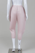 Load image into Gallery viewer, Mu.ni pink stretch balloon pants with tapered bottom with elasticized waist and side pockets
